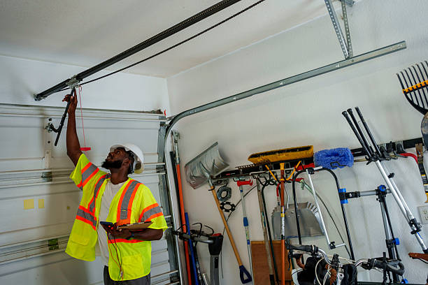 Professional Garage Door Roller Replacement technician working in Orfordville, WI